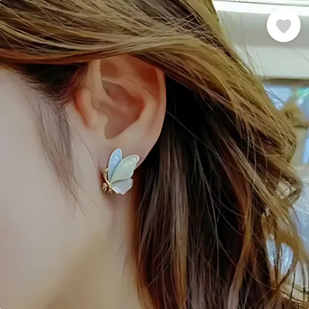 butterfly earrings worn by woman colorful stylish studs