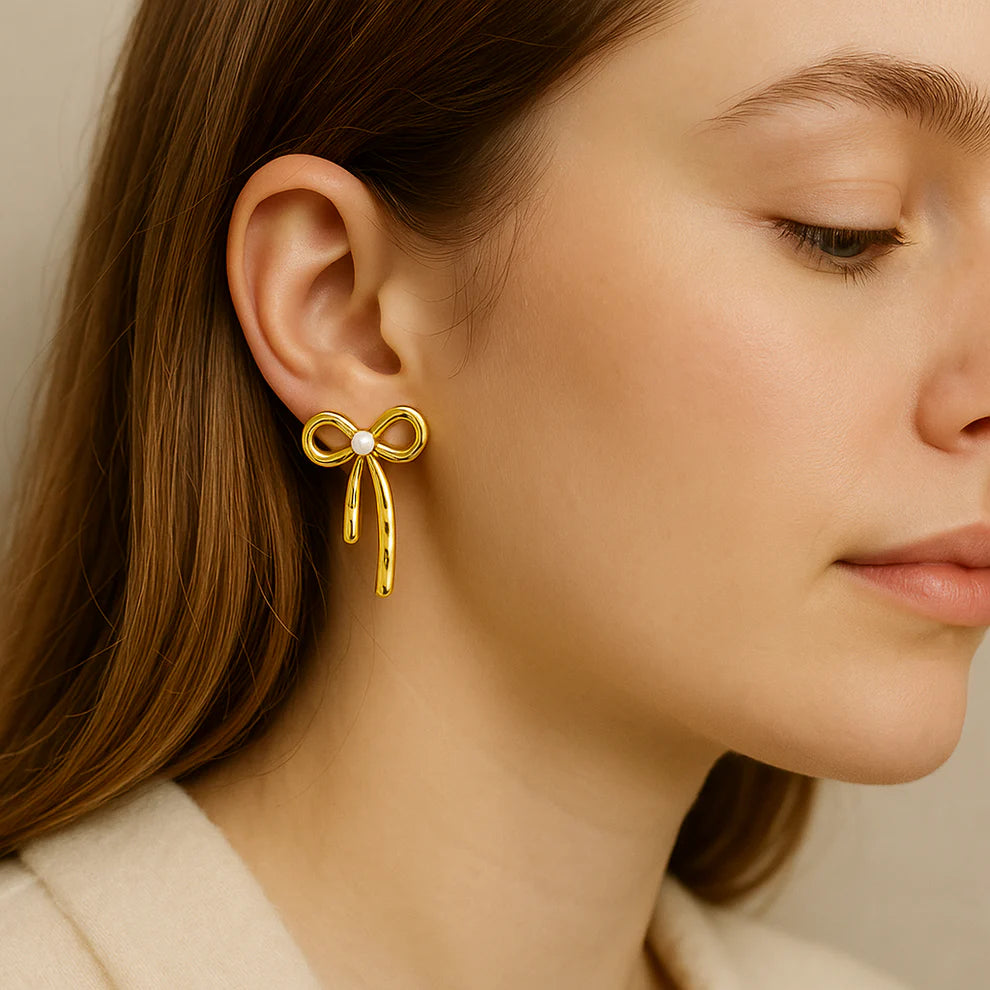 Gold bow drop earrings lightweight anti tarnish jewellery