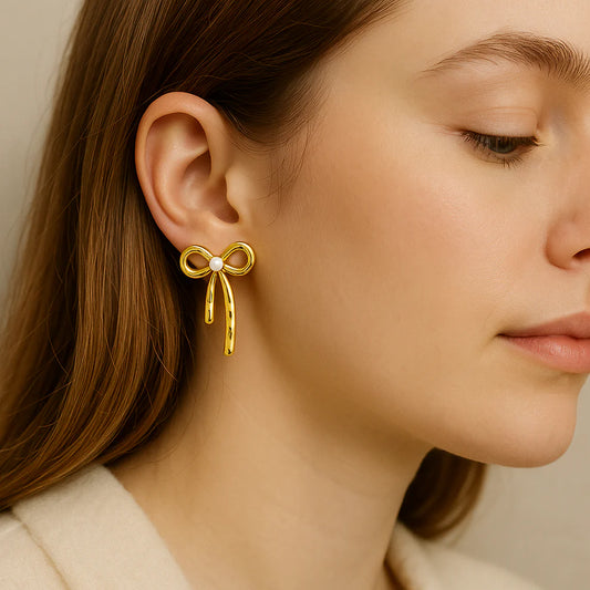Gold bow drop earrings lightweight anti tarnish jewellery