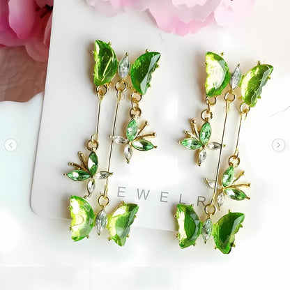 green butterfly drop earrings