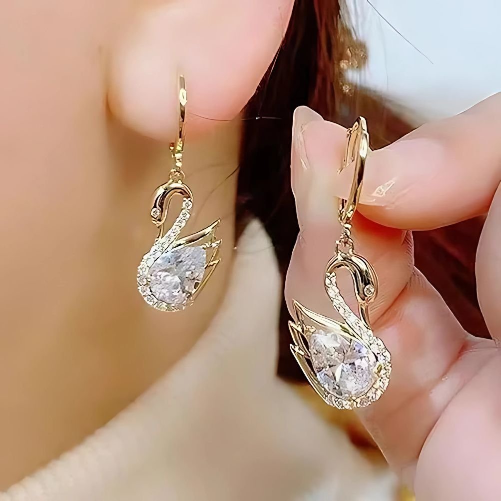 swan huggie earrings